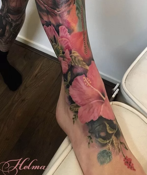 Foot tattoo ibiza flowers in color realistic