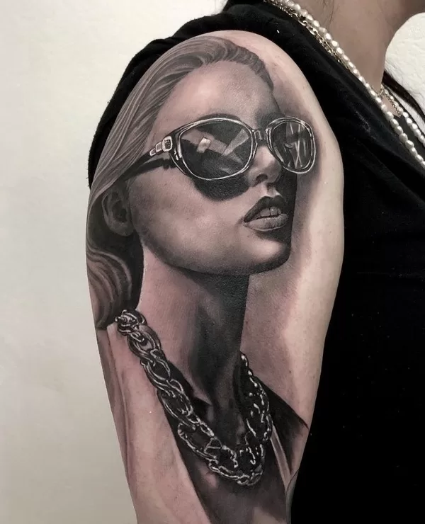 Girl with sunglasses black and grey ibiza tattoo